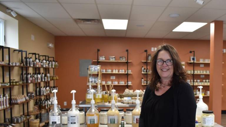 Cindy Allyn in her brand-new refill store, the Sustainafillery, in Florida, NY.