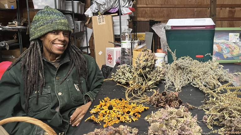 Sarah Elisabeth, an apothecary, edible landscaper and teacher