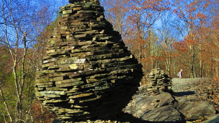 The ridgetop known as Jensen’s Ledges is crowned by a series of sculptures created by stacking bluestone slabs.