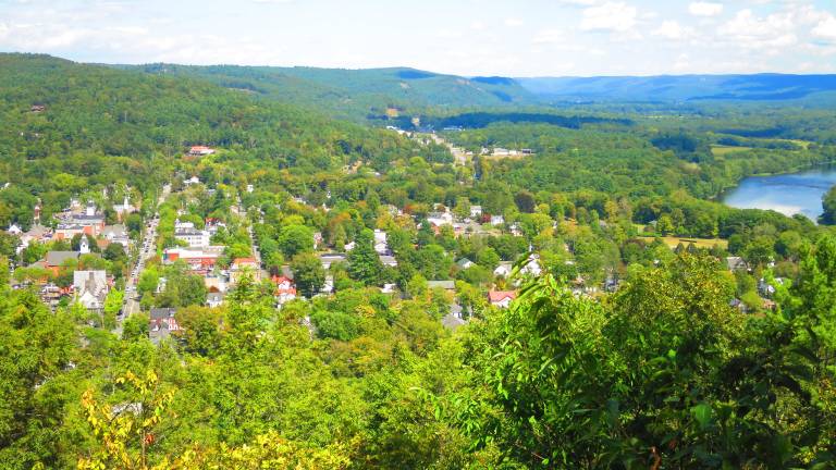“On the Knob during the summer, music from Milford’s outdoor festivals wafts upward, so that you can hear it nearly as well as you would if you were downtown.”