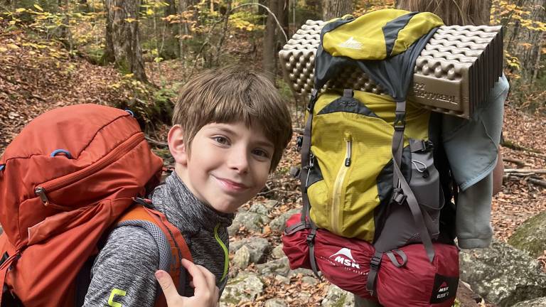 Eli, 11 (front) and his older brother Able, 14, went on without their parents to summit two more Adirondack peaks.